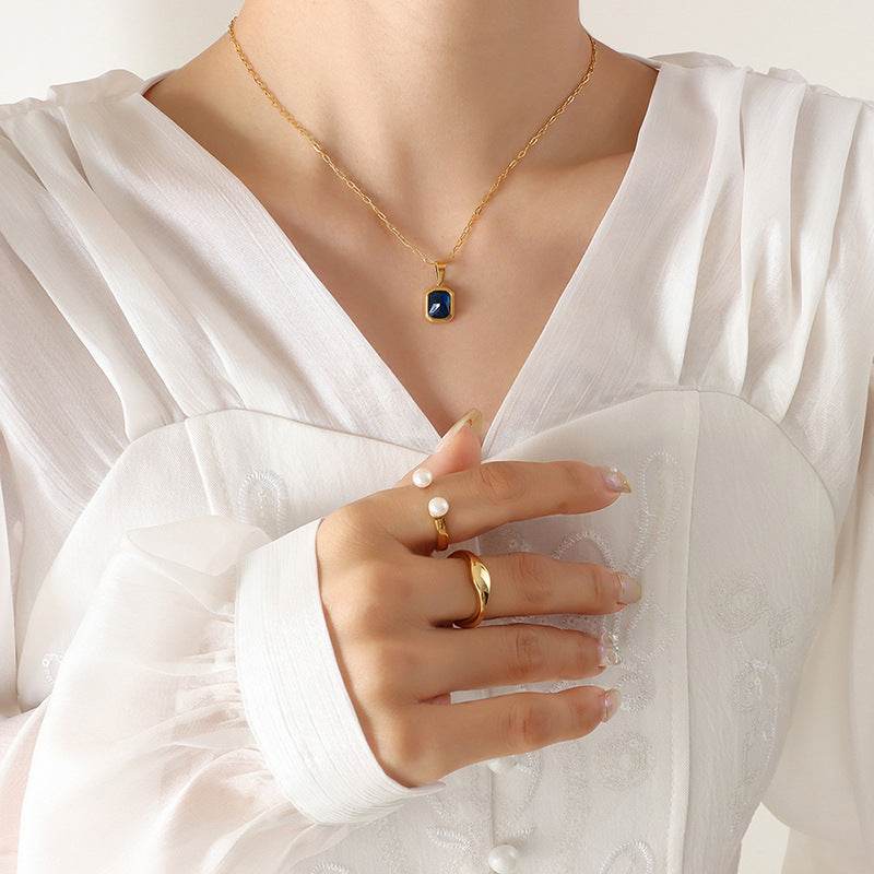European And American Titanium Steel Plated 18K Real Gold High-grade Light Luxury Inlaid Blue Crystal